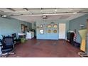 Attached garage with laundry area and ample storage space at 1592 Martin Luther King Ne Blvd, Winter Haven, FL 33881