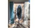 Beautiful front door featuring an oval stained glass window, framed in white trim at 2681 Robin Ave, Kissimmee, FL 34744