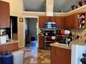 Spacious kitchen with ample cabinetry and stainless steel appliances at 26 Lake Diamond Ave, Ocala, FL 34472
