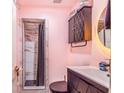 Clean bathroom with marble shower and vanity at 103 Las Flores, Winter Haven, FL 33884