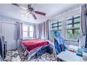 Bright bedroom with a bed, desk and window at 103 Las Flores, Winter Haven, FL 33884