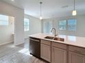 Modern kitchen with stainless steel appliances and stylish countertops at 272 Muscogee Ln, Orlando, FL 32825