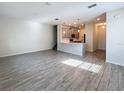 Open-concept living room with tile flooring and lots of natural light at 272 Muscogee Ln, Orlando, FL 32825
