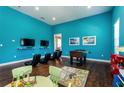 Playroom with foosball table, TV, and ' toys at 8906 Shine Dr, Kissimmee, FL 34747