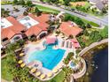 Aerial view of community pool and clubhouse at 217 Montoro Ln, Davenport, FL 33837