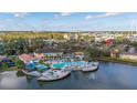 Community features a resort-style pool, lake, and lush landscaping at 2713 Roadster Ln, Kissimmee, FL 34746