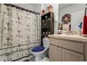 Nautical themed bathroom with shower/tub combo at 362 Alexzander Way, Winter Haven, FL 33881