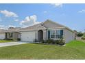 Newly built one-story house with a two-car garage at 362 Alexzander Way, Winter Haven, FL 33881