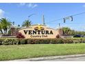 Ventura Country Club entrance sign with tropical landscaping and sunny blue skies at 3984 Atrium Dr # 4, Orlando, FL 32822