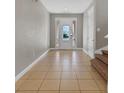 Bright entryway with tile floors and neutral walls at 7430 Marker Ave, Kissimmee, FL 34747