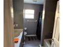Clean bathroom with shower/tub combo and updated flooring at 1370 Fern Ln, Daytona Beach, FL 32117