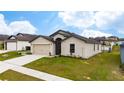 One story house with a two car garage and a spacious yard at 1606 Steely Dr, Dundee, FL 33838