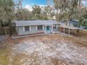 Newly renovated home with large yard and carport at 645 King St, Eustis, FL 32726