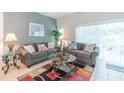 Living room with two sofas and a coffee table at 8407 Crystal Cove Cv, Kissimmee, FL 34747