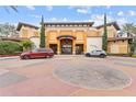 Main building entrance with circular driveway at 12544 Floridays Resort Dr, Orlando, FL 32821