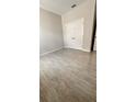 Bedroom with double door closet and tile floors at 115 W Murphy St, Davenport, FL 33837