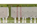 Aerial view showcasing a townhome's location in a community at 1481 Discovery St, Davenport, FL 33896
