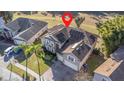 Housetop view showing a two-story house with solar panels at 2136 Laurel Blossom Cir, Ocoee, FL 34761