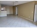 Spacious living room with tile floors and neutral walls at 4332 S Kirkman Rd # 1013, Orlando, FL 32811