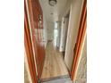 Open entryway with wood-look floors leading into the condo at 10232 Turkey Lake Rd # 181, Orlando, FL 32819