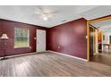 Spacious living room with hardwood floors and a ceiling fan at 1960 Murray Rd, Fort Meade, FL 33841