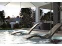 Inviting pool with lounge chairs for ultimate relaxation at 5151 Marina Dr, St Cloud, FL 34771