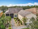 One-story house with a landscaped front yard and driveway at 119 Verona Dr, Kissimmee, FL 34759