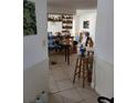 The open-concept dining room features neutral tile floors and a seamless transition to the rest of the home at 615 Gazelle Dr, Kissimmee, FL 34759