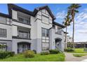 Condo building showcasing modern facade and landscaping at 3701 Castle Pines Ln # 3927, Orlando, FL 32839