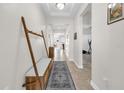 Bright and spacious entryway with a bench and coat rack at 4540 Sequel Rd, Kissimmee, FL 34746
