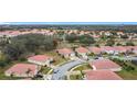 Neighborhood view featuring houses and a residential street at 3033 Sangria St, Kissimmee, FL 34744