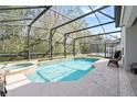Relaxing screened-in pool and spa, perfect for outdoor enjoyment at 901 Marcello Blvd, Kissimmee, FL 34746