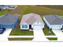 Single-Gathering home, bird's eye view, in a residential neighborhood at 1057 Cambridge Dr, Winter Haven, FL 33881