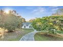 House exterior with a walkway leading to the entrance at 2650 Hilliard Ct, Kissimmee, FL 34744