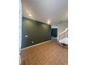 Bright and spacious entryway with tile flooring and staircase at 3459 Allegra Cir, St Cloud, FL 34772
