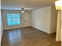 Bright living room with wood-look floors at 5920 Nw 65Th St, Ocala, FL 34482