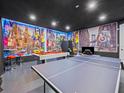 Spacious game room with murals, a pool table, and ping pong at 733 Desert Mountain Ct, Reunion, FL 34747