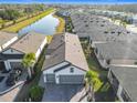 Single-Gathering home with a two-car garage, located near a canal at 1062 Umbria Dr, Kissimmee, FL 34759