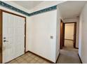 Simple entryway with tiled floor and neutral walls at 219 Macon Way, St Cloud, FL 34769