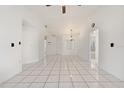 Spacious living room featuring tile flooring and ceiling fan at 511 Cardinal Dr, Kissimmee, FL 34759