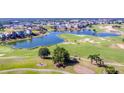 Aerial view of upscale community with golf course and lakes at 7658 Whisper Way # 202, Reunion, FL 34747