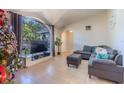Spacious living room with a large TV and comfortable seating at 1188 Anne Elisa Cir, St Cloud, FL 34772