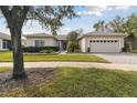 Well-maintained one-story home with attractive landscaping at 554 Heartwell Dr, Kissimmee, FL 34759