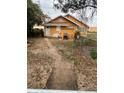 Backyard with a shed, and wooden walkway at 342 E Tillman Ave, Lake Wales, FL 33853