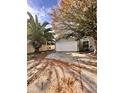 Newly renovated home with a spacious front yard and driveway at 656 Oakford Way, Orlando, FL 32811