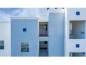 Modern building exterior, showcasing multiple balconies at 3131 Paradox Cir # 401, Kissimmee, FL 34746