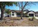 Cute one-story house with a two-car garage at 8079 Cloverglen Cir, Orlando, FL 32818