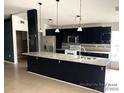Spacious kitchen featuring granite countertops and dark cabinetry at 1005 Tequesta Trl, Lake Wales, FL 33898