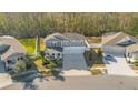 Two-story house in a residential neighborhood with a large yard at 11120 Robert Frost Dr, Winter Garden, FL 34787