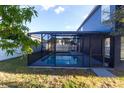 Screened-in pool with a concrete deck at 1161 Kempton Chase Pkwy, Orlando, FL 32837